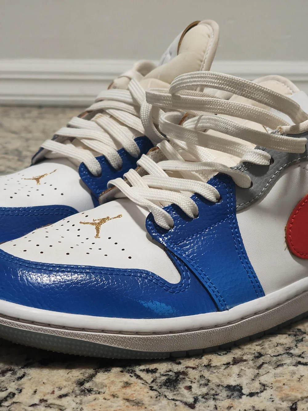 Jordan Men’s Low-Top Sneakers in White, Blue, Red